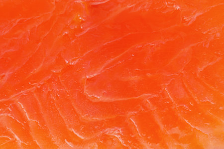 Texture of red salmon fish as background macro photo. Food, fish, omega.の写真素材