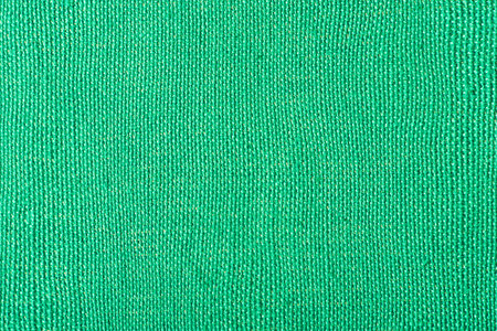 Green fabric background macro photo horizontal frameの写真素材