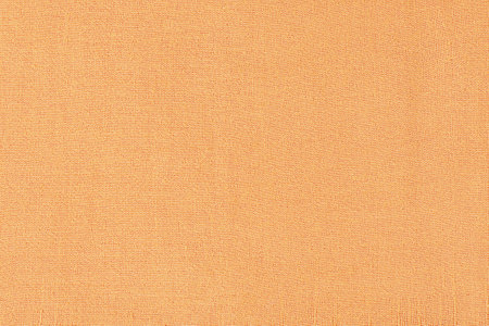 Texture of beige muslin fabric. Cotton as a background.の写真素材