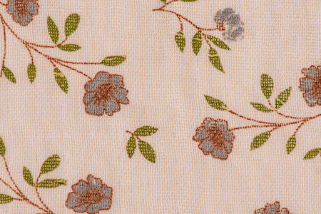 Texture of beige flower fabric. Cotton as a background.の写真素材