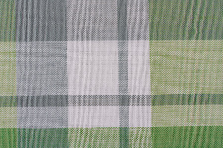 Green and white checkered fabric as a backgroundの写真素材