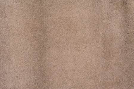 Beige background genuine leather suede macro photoの写真素材
