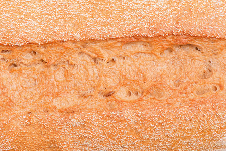 Buckwheat baguette as background. Bread texture macro photo