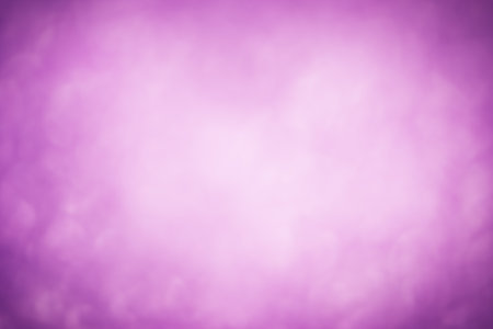 Purple abstract blurred defocus light background. Purple color with vignetteの写真素材