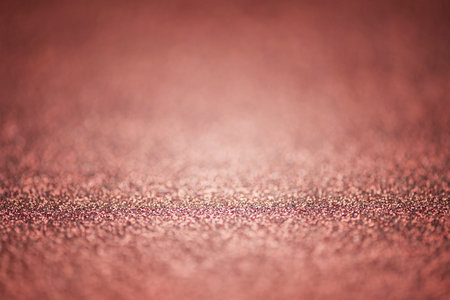 Glitter background in brown color, thin focus part.