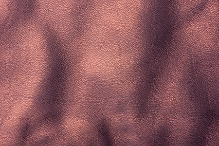 Natural leather dyed brown macro photo as a backgroundの写真素材