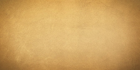 Yellow warm suede genuine leather with vignette as background. Yellow suedeの写真素材
