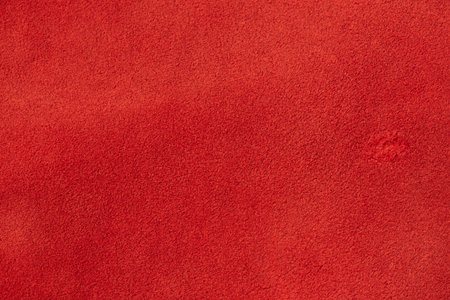 Red suede background macro photo as backgroundの写真素材