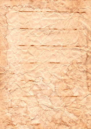 Old paper texture. Old creased paper background stained with coffeeの写真素材