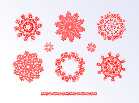 Collection of different red snowflakes on white backgroundのイラスト素材
