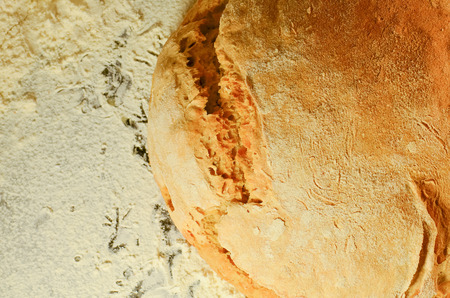 Bread on the table.  Detail of fresh traditionally baked bread. Bread on dark background.  Bakery,...