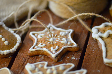 Biscuits with sugar glaze on wooden background.の写真素材