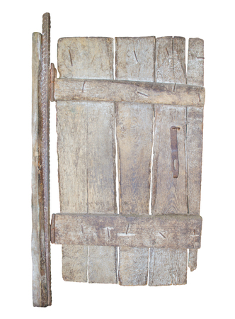 Barn door isolated on white background. Vintage rural texture of door. Detail of wooden barn door isolatedの写真素材