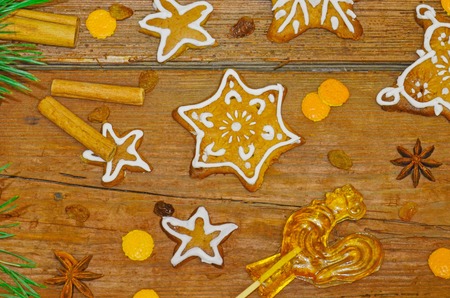 Christmas cookies on the wooden background. Gingerbread cookie for New Year 