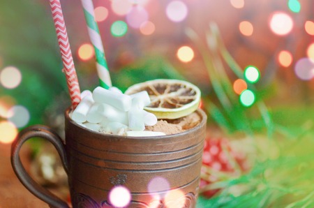 Cup of cocoa on a festive background. Cocoa  in  brown clay cup closeの写真素材