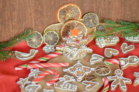 Christmas gingerbread, spices and decorations with fir tree branches. Merry Christmas and  happy...