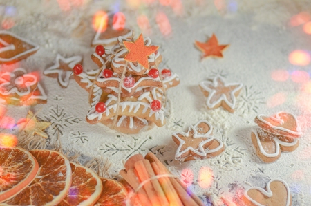 Christmas gingerbread cookies on wooden table top view.の写真素材