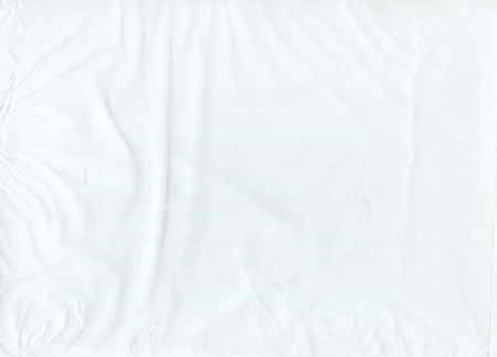 White crumpled cellophane transparent. Cellophane for packaging, product protection. White polyethylene texture. Polyethylene bag textureの写真素材