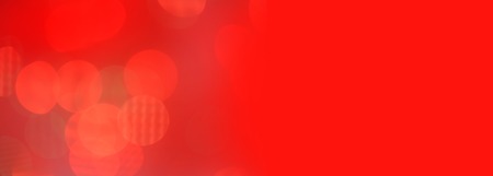 Abstract red defocused lights. Red bokeh abstract background.の写真素材