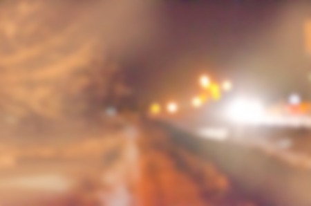Abstract blur bokeh road in night time. Blurred abstract  cityscape background.の写真素材
