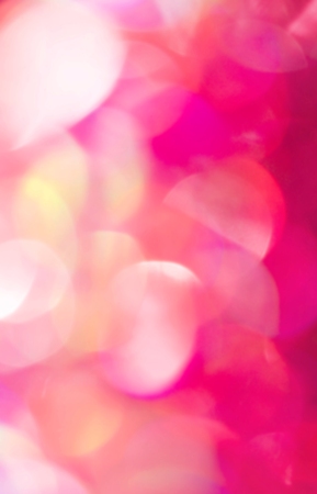 Pink glitter vintage lights background. Abstract pink bokeh.の写真素材