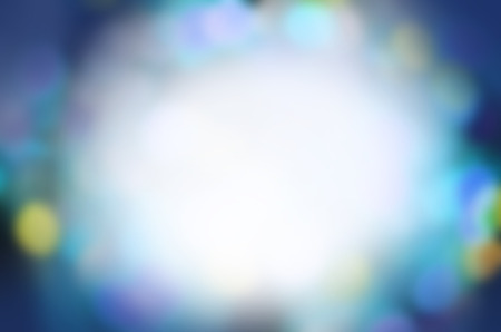 Glittering blue background. Abstract blue bokeh background.の写真素材