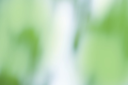 Green bokeh background. Defocused abstract green background. Blur nature green park. Sunny green nature backgroundの写真素材