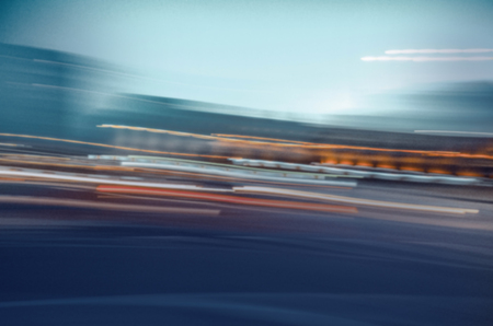 Abstract blur city bokeh lights. Defocused bokeh street in European city background. City blurred lights background. Night bokeh lights in big cityの写真素材
