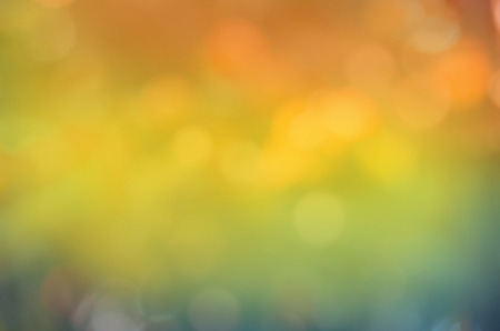 Autumn background with bright yellow leaves. Autumn leaves bokeh autumn nature background. Blurred...