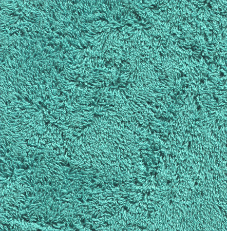 Textured fabric background in mint color. Background and texture for design. Textured fabric mint towel  background.の写真素材