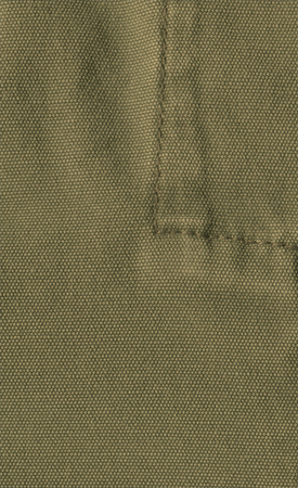 Mustard yellow cloth fabric. Mustard color fabric closeup