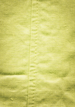 Mustard yellow cloth fabric. Mustard color fabric closeupの写真素材