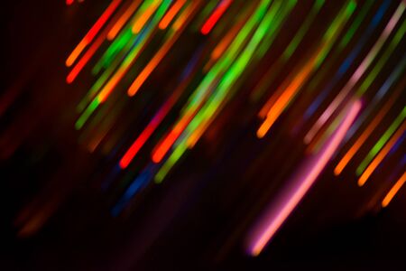 Blurred background of night bokeh concert. Stage lights on concert. Defocused concert lighting.