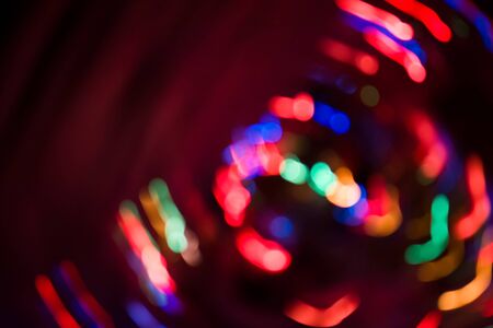 Bokeh lights on black background. Bokeh abstract lights background.
