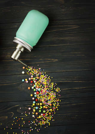 Bottle with air pump dispenser full of liquid soap on a black background. Liquid soap on the table....