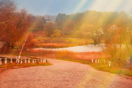 Colorful autumn landscape. Beauty of autumn season in the village.  Colorful autumn landscape in the...