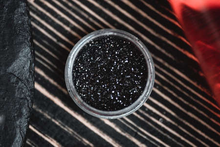 Glitter in jars. Sparkling beauty shimmer. Glitter for manicure

