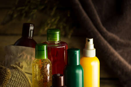 Cosmetics products and tools. Set of body care products on wooden backgroundの写真素材