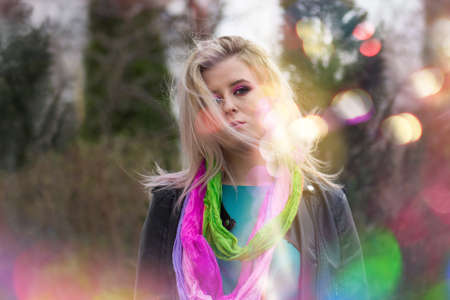 Women enjoying rock music during a summer festival. Hipster girl enjoying music party outdoor.の写真素材