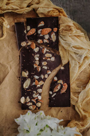 Close up of chocolate with almonds. Top view chocolateの写真素材