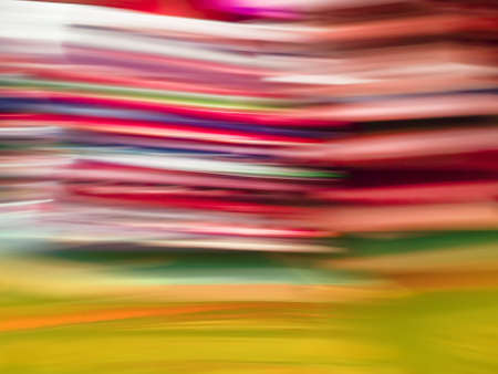 Stack piles of literature text archive defocused texture for your design. Bookshelves in school...