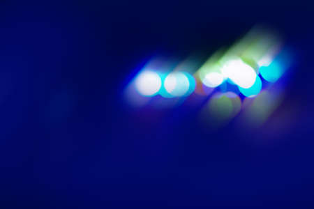 Smooth transitions of iridescent colors. Iridescent sparkling multicolor blurred glow on black