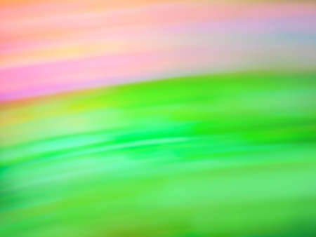 Rural landscape field and grass and colorful bright sunset blur background.