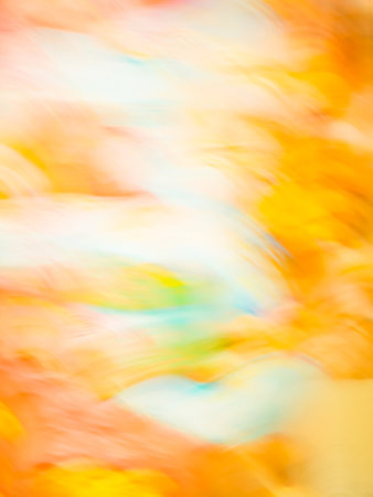 Gold motion bokeh background for Christmas background. orange and yellow golden blur backgroundの写真素材