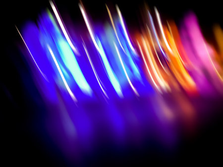 Blurry light painting abstract art texture on a black background.