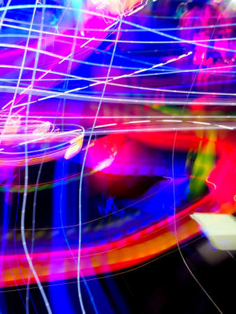 Shiny glitters blur defocused rainbow. Background with rainbow colorful blur on blackの写真素材