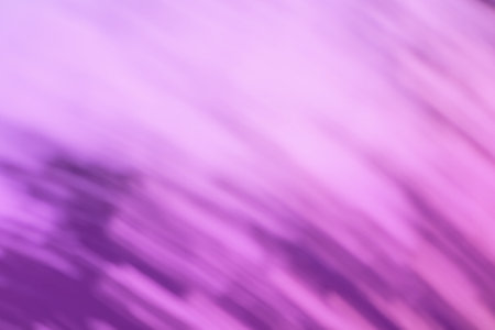 Violet bokeh abstract light background. Motion blur violet backdrop.の写真素材