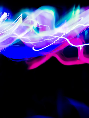 Light painting be creative blurry effect bokeh background on a black.の写真素材