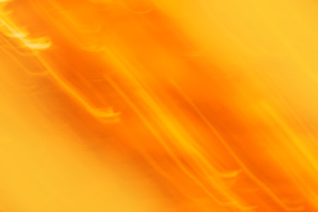 Yellow sunny bokeh background from nature. Nature sunset in evening blurred wallpaper.