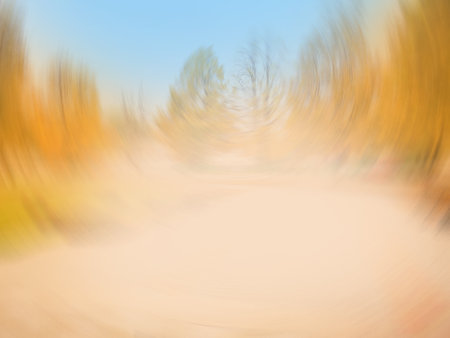 Autumnal landscape natural bokeh backdrop. Sunny abstract fall nature landscape backdrop.の写真素材